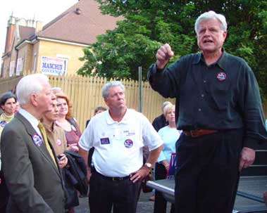 Kennedy campaigns in Logan with Byrd, left.